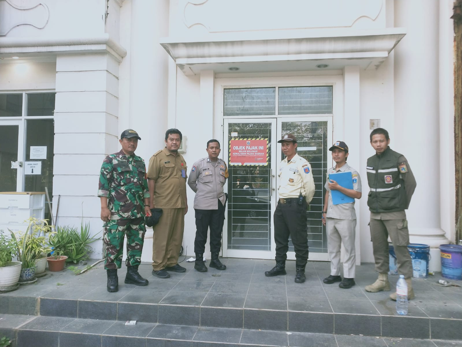 Pengamanan Pemasangan Tanda Objek Pajak Daerah di Penjaringan Berjalan Aman, Polisi Pastikan Kegiatan Kondusif